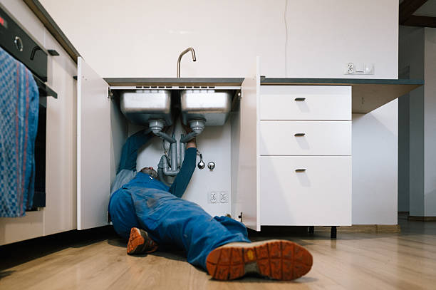 Professional Drain Cleaning technician working in Queenstown, MD